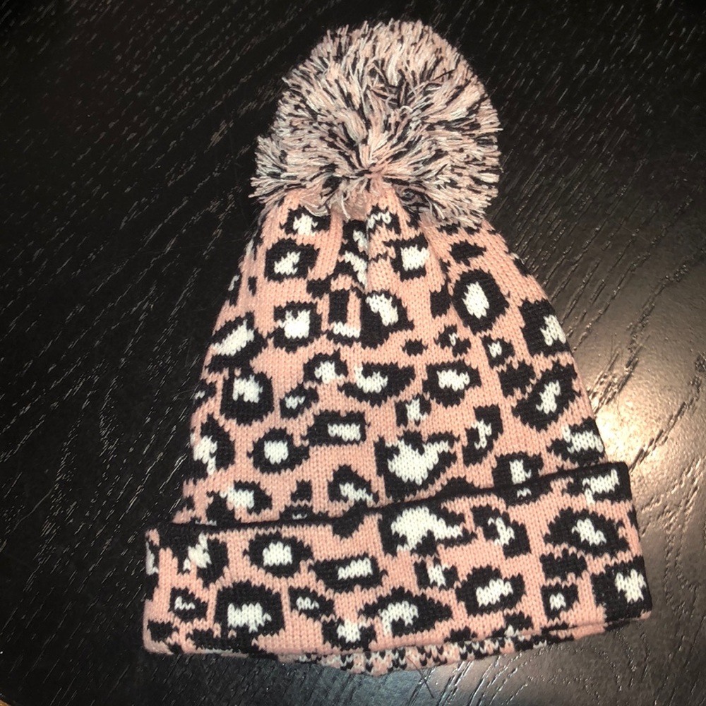 NWOT- Animal print hat w/ matching yarn Pom!